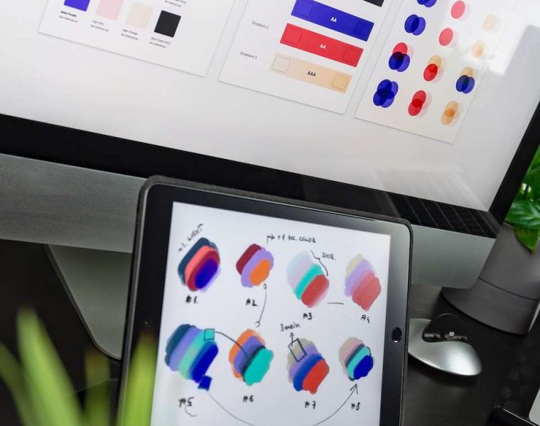 black iPad displaying color gradient